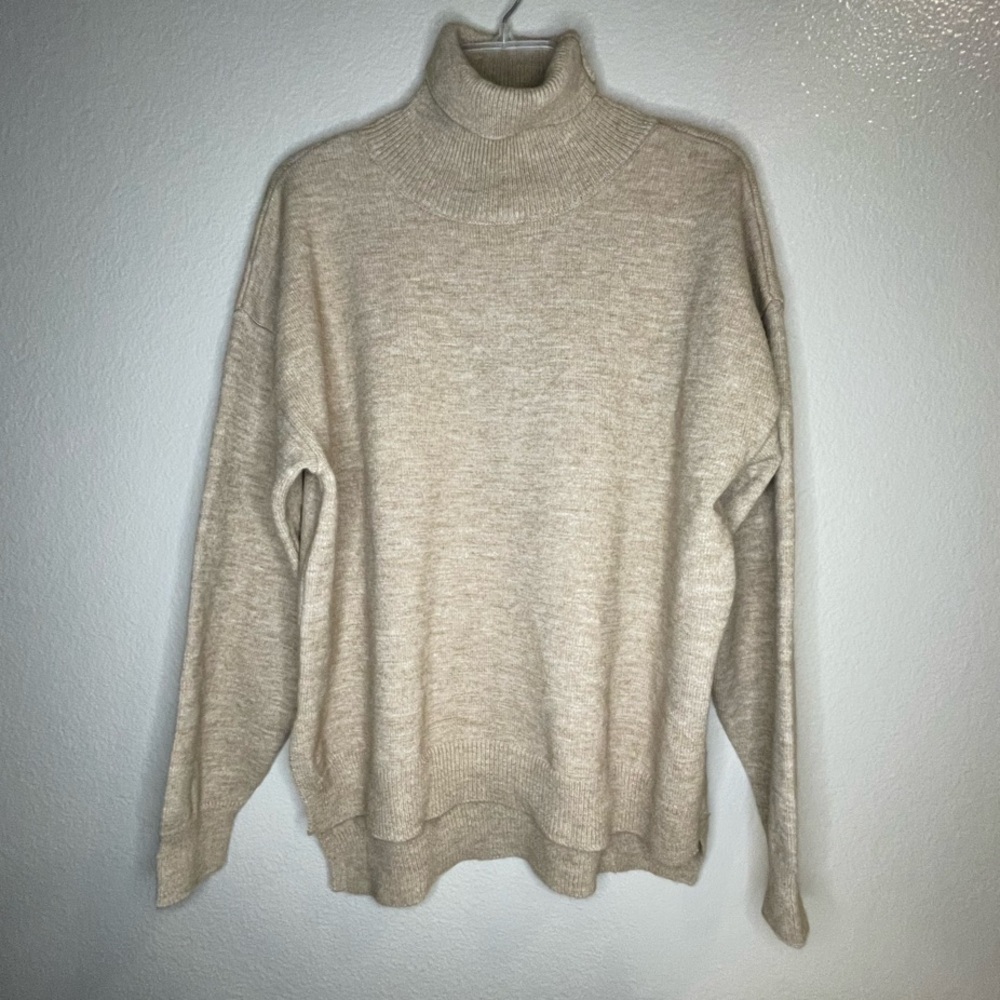 Cream Turtleneck Sweater with Relaxed Fit and Long Sleeves